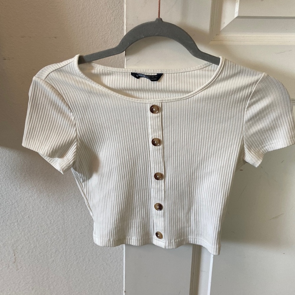 White shirt with false buttons